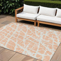 10' X 14' Peach And Ivory Abstract Washable Non Skid Indoor Outdoor Area Rug