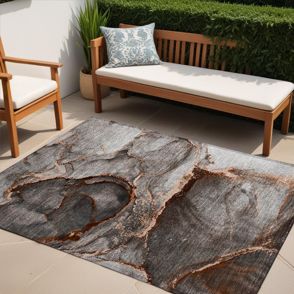 5' X 8' Peach Abstract Washable Non Skid Indoor Outdoor Area Rug