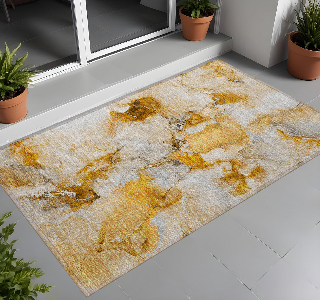 3' X 5' Orange And Ivory Abstract Washable Non Skid Indoor Outdoor Area Rug