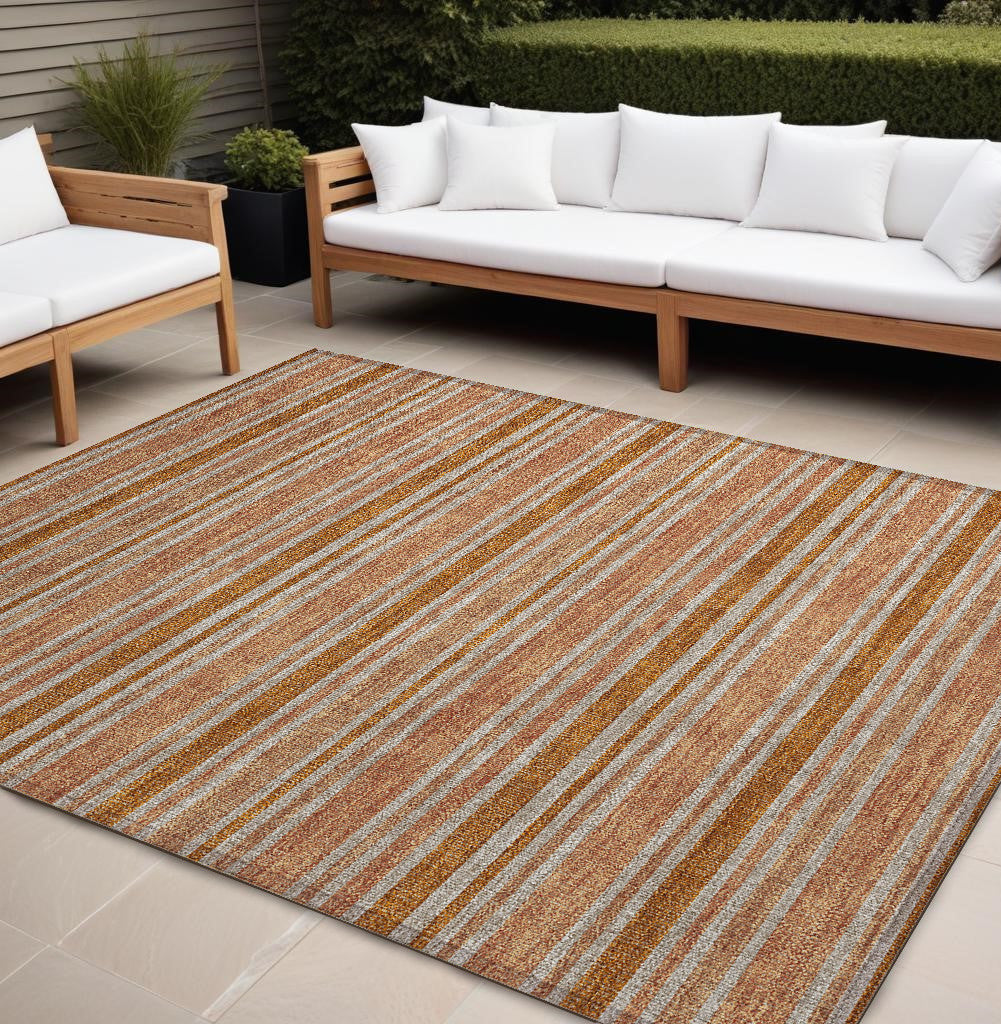 8' X 10' Beige And Orange Striped Washable Non Skid Indoor Outdoor Area Rug