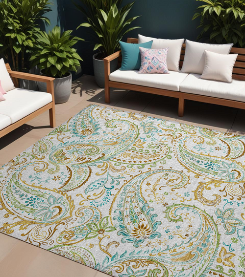 10' X 14' Ivory And Gold Paisley Washable Non Skid Indoor Outdoor Area Rug