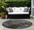 8' Round Black And Ivory Round Abstract Washable Non Skid Indoor Outdoor Area Rug