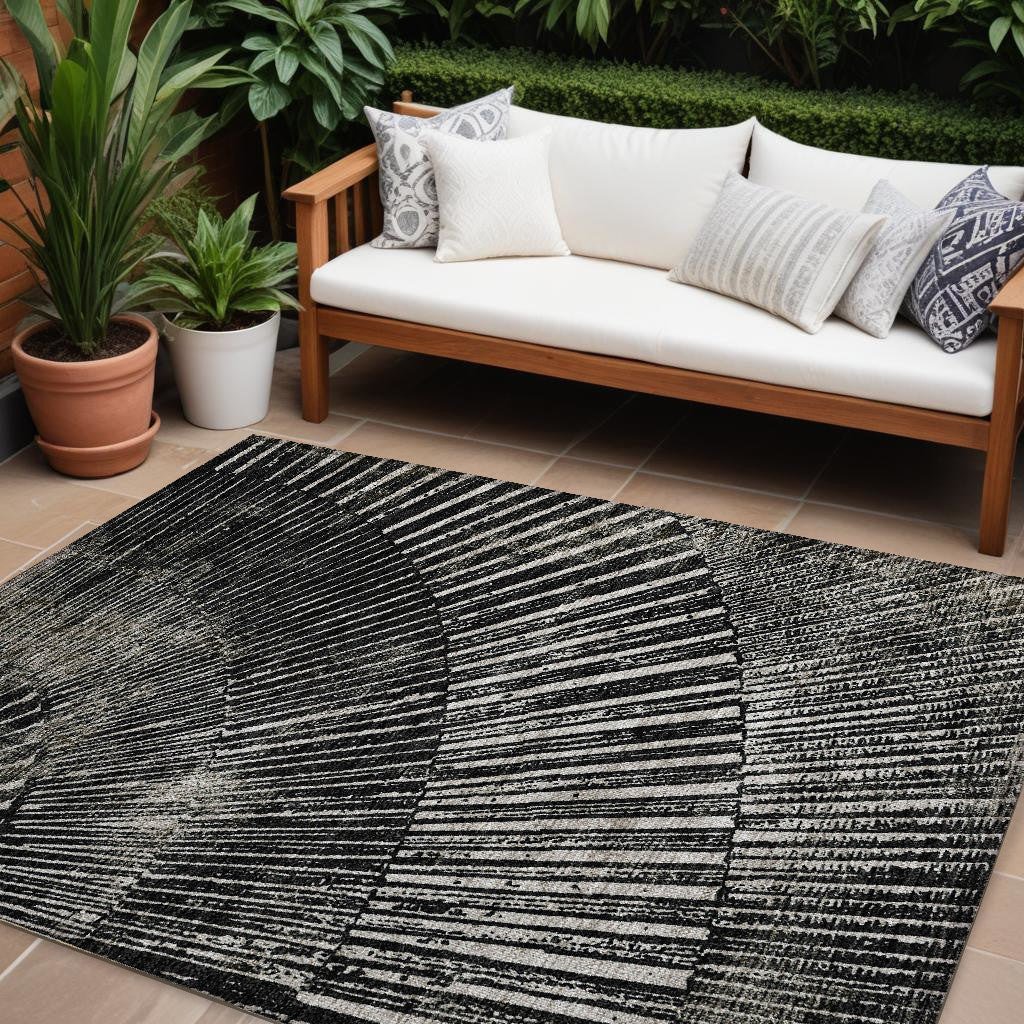 10' X 14' Black And Ivory Abstract Washable Non Skid Indoor Outdoor Area Rug