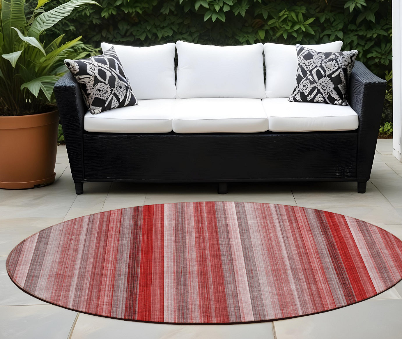 8' Round Gray Pink And Red Round Striped Washable Non Skid Indoor Outdoor Area Rug