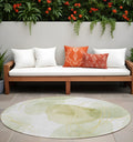 8' Round Green And Ivory Round Abstract Washable Non Skid Indoor Outdoor Area Rug