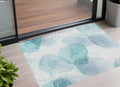 3' X 5' Teal And Ivory Abstract Washable Non Skid Indoor Outdoor Area Rug