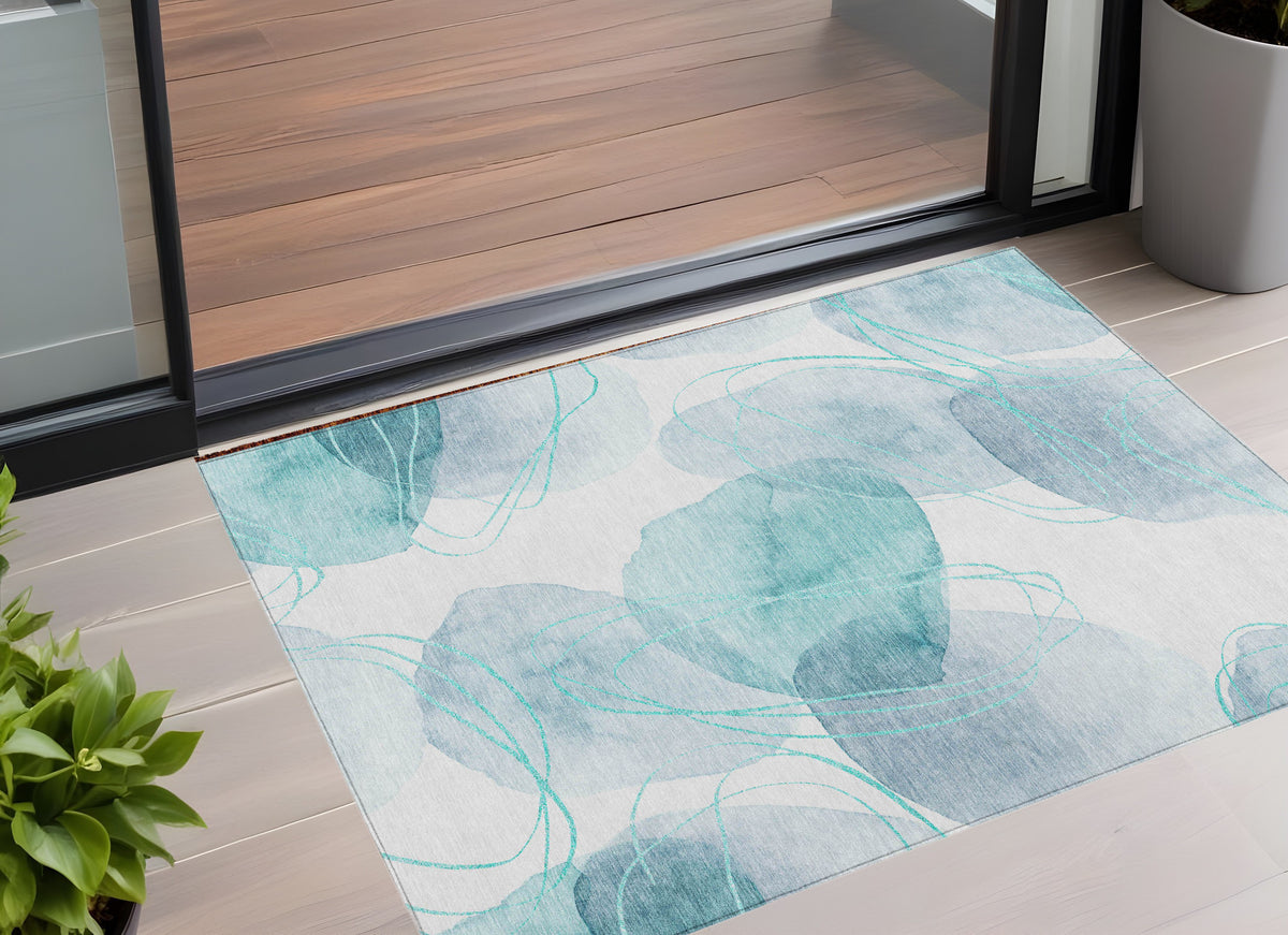 3' X 5' Teal And Ivory Abstract Washable Non Skid Indoor Outdoor Area Rug