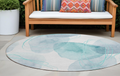 8' Round Teal And Ivory Round Abstract Washable Non Skid Indoor Outdoor Area Rug