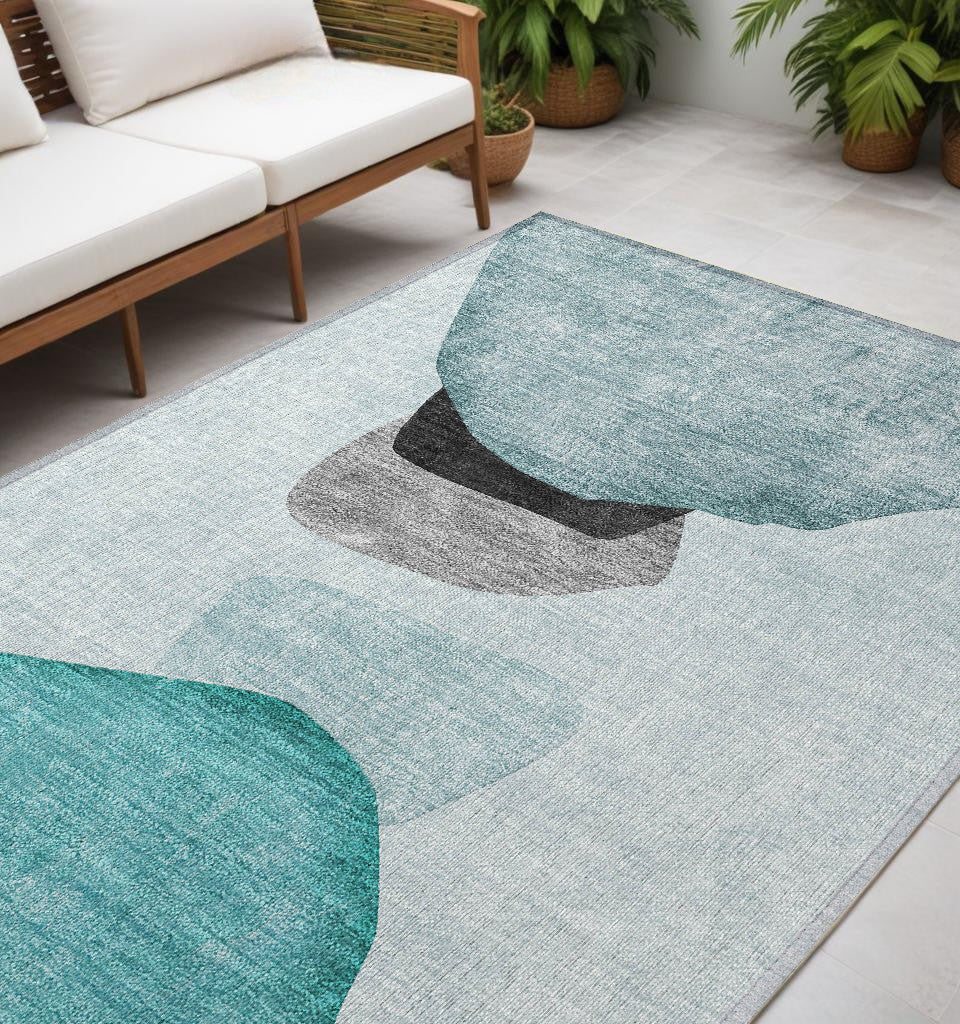 5' X 8' Ivory Teal And Gray Abstract Washable Non Skid Indoor Outdoor Area Rug