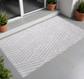 3' X 5' Lavender And Ivory Geometric Washable Non Skid Indoor Outdoor Area Rug