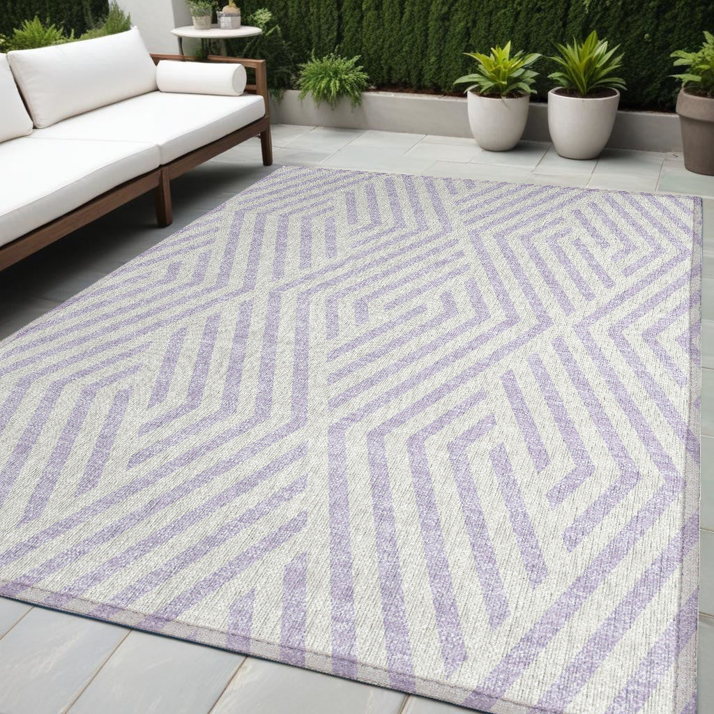 5' X 8' Lavender And Ivory Geometric Washable Non Skid Indoor Outdoor Area Rug