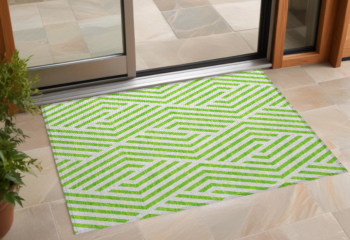 3' X 5' Lime Green And White Geometric Washable Non Skid Indoor Outdoor Area Rug