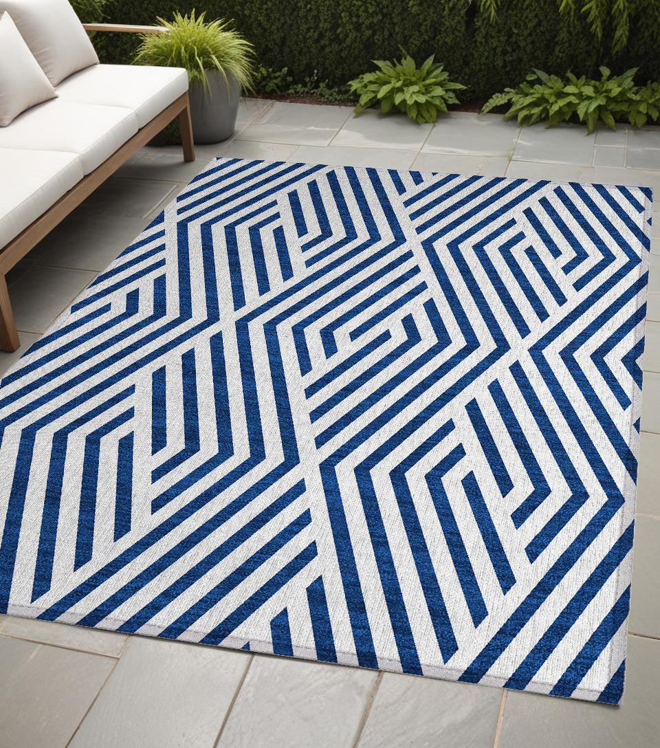 5' X 8' Navy And White Geometric Washable Non Skid Indoor Outdoor Area Rug