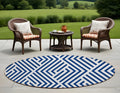 8' Round Navy And White Round Geometric Washable Non Skid Indoor Outdoor Area Rug