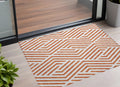 3' X 5' Orange And White Geometric Washable Non Skid Indoor Outdoor Area Rug