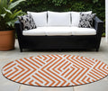 8' Round Orange And White Round Geometric Washable Non Skid Indoor Outdoor Area Rug