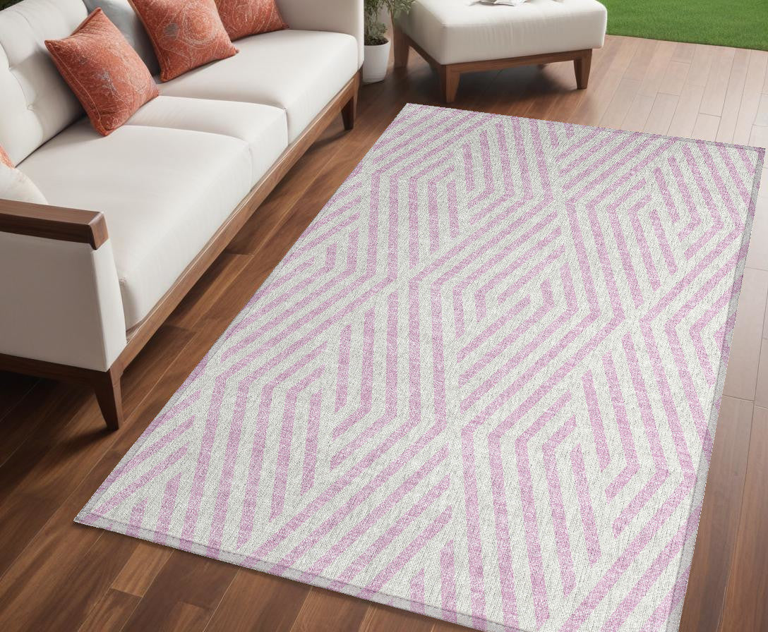 5' X 8' Pink And White Geometric Washable Non Skid Indoor Outdoor Area Rug
