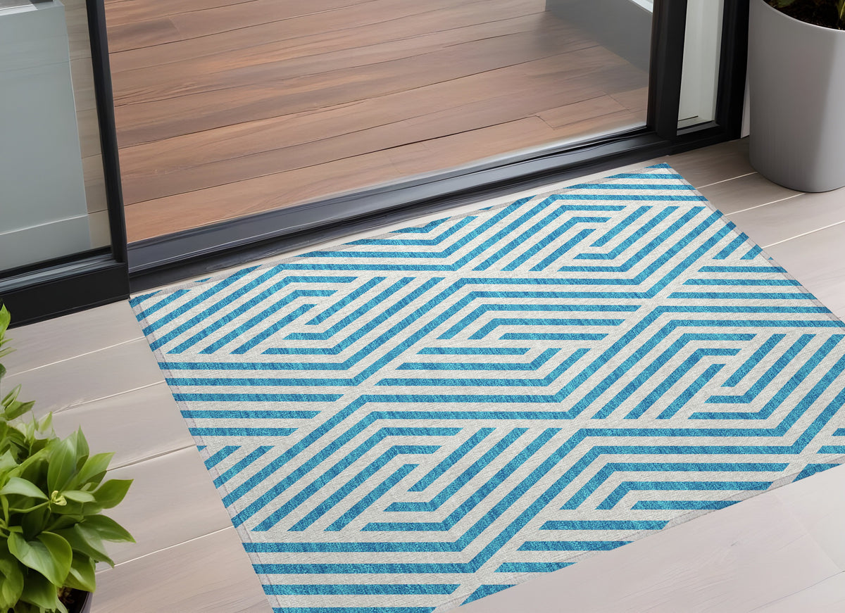 3' X 5' Teal And White Geometric Washable Non Skid Indoor Outdoor Area Rug