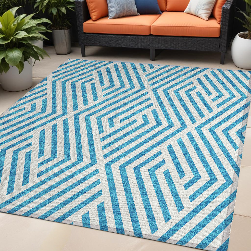 5' X 8' Teal And White Geometric Washable Non Skid Indoor Outdoor Area Rug