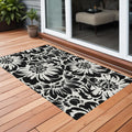 3' X 5' Black And Ivory Floral Washable Non Skid Indoor Outdoor Area Rug