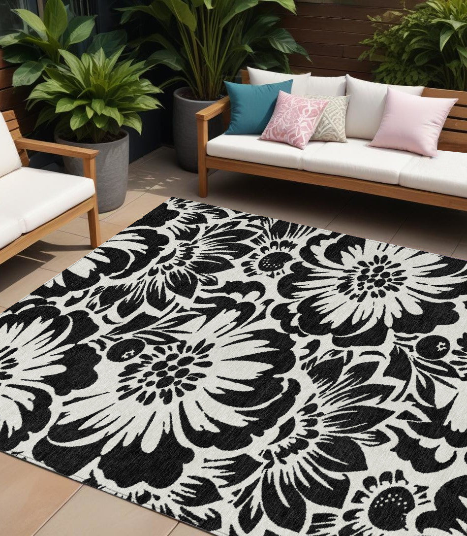 8' X 10' Black And Ivory Floral Washable Non Skid Indoor Outdoor Area Rug