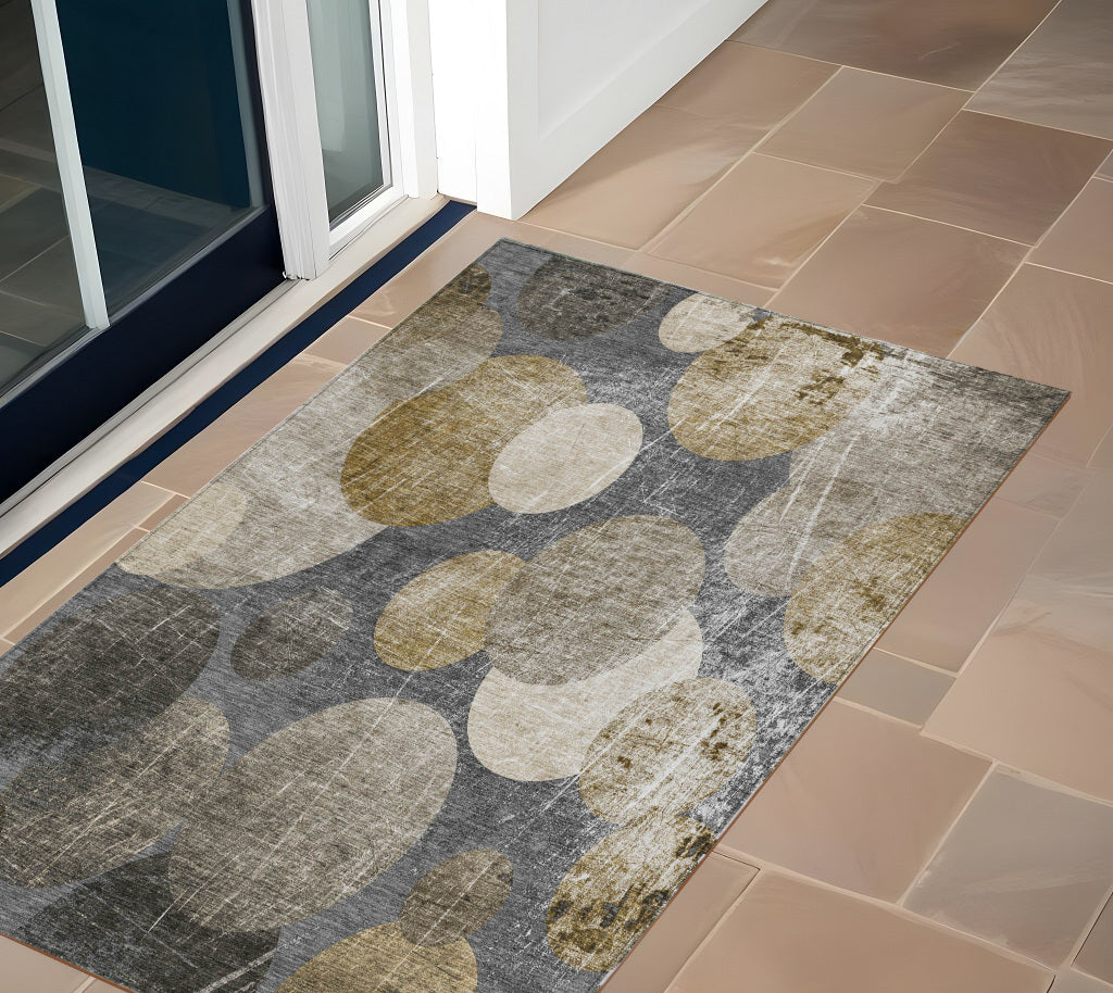 2' X 3' Brown Beige And Ivory Abstract Washable Non Skid Indoor Outdoor Area Rug