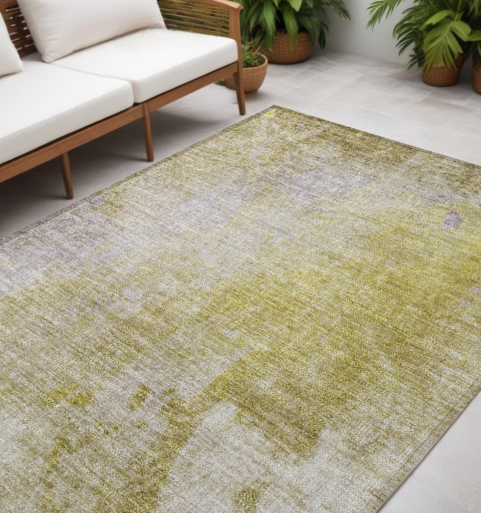 5' X 8' Gold Beige And Purple Abstract Washable Non Skid Indoor Outdoor Area Rug