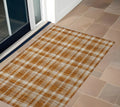 2' X 3' Orange And Ivory Plaid Washable Non Skid Indoor Outdoor Area Rug