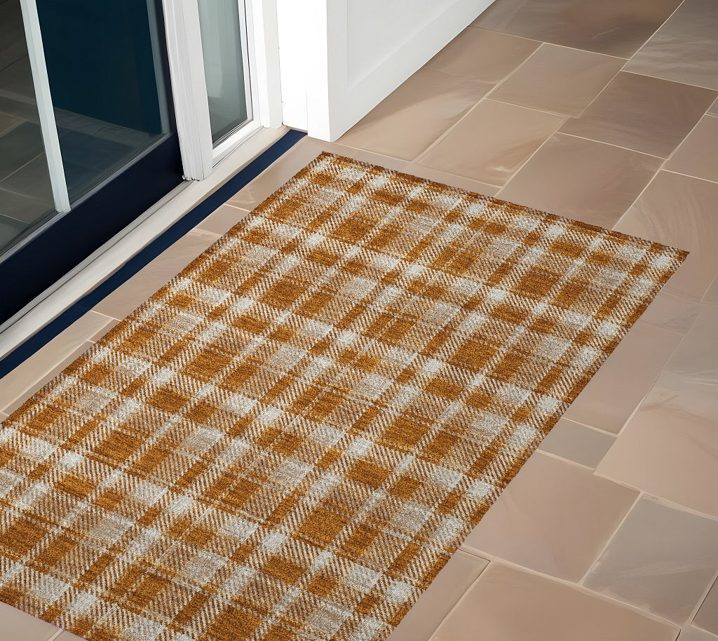 3' X 5' Orange And Ivory Plaid Washable Non Skid Indoor Outdoor Area Rug