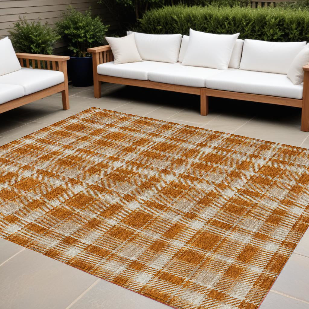 9' X 12' Orange And Ivory Plaid Washable Non Skid Indoor Outdoor Area Rug