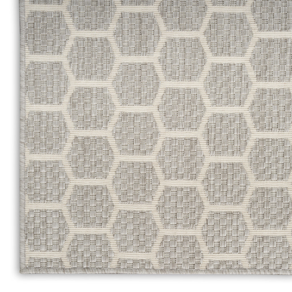 10 Gray And Ivory Geometric Indoor Outdoor Runner Rug