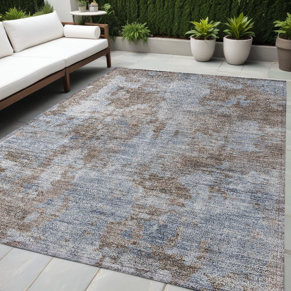 5' X 8' Mocha And Blue Abstract Washable Non Skid Indoor Outdoor Area Rug
