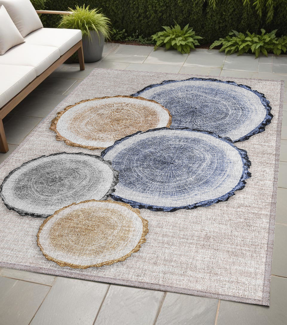 5' X 8' Beige Blue And Gold Faux Bois Washable Non Skid Indoor Outdoor Area Rug