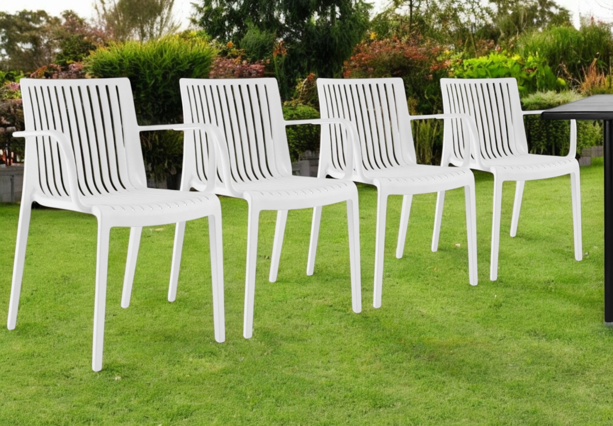 Set of Four 22'' White Heavy Duty Plastic Outdoor Stacking Arm Chairs