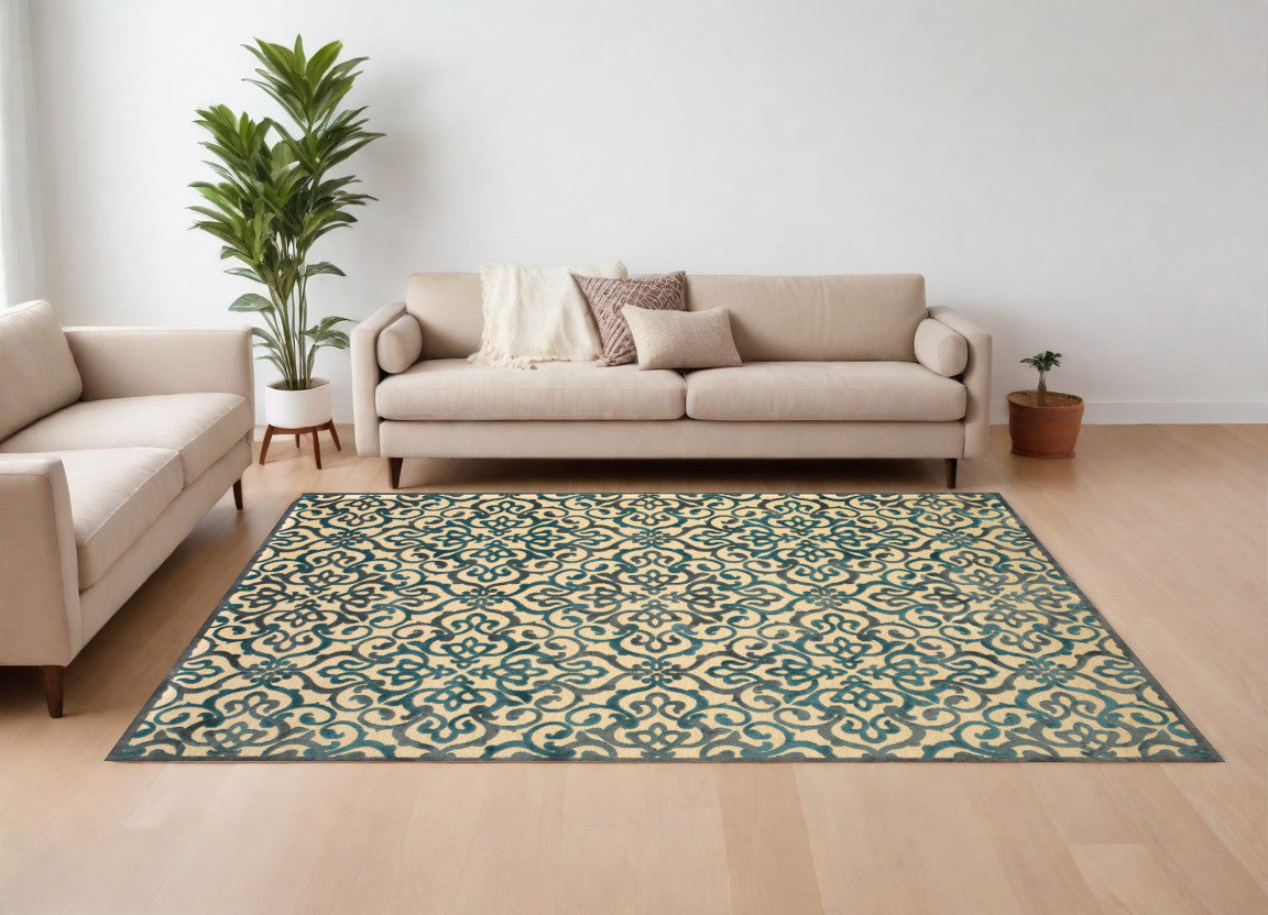 8' X 11' Tan Blue and Taupe Floral Power Loom Area Rug