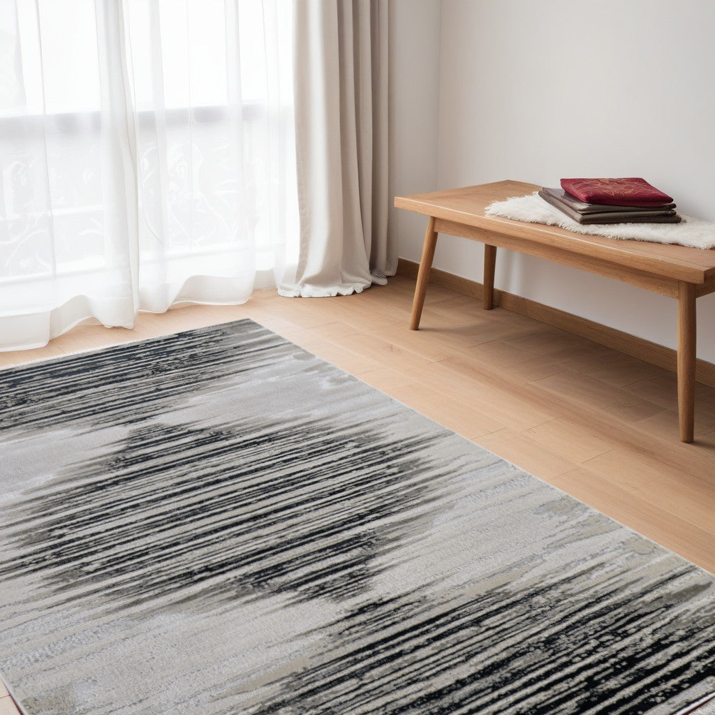 5' X 8' Black and Silver Geometric Power Loom Area Rug