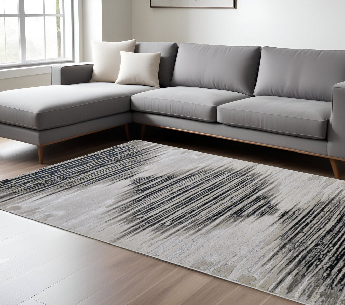 7' X 10' Black and Silver Geometric Power Loom Area Rug