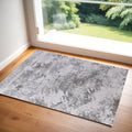 2' X 3' Gray and Silver Abstract Power Loom Worn Faded Area Rug