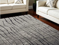 7' X 10' Gray and Black Abstract Power Loom Area Rug