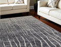 7' X 10' Ivory Gray and Black Abstract Power Loom Area Rug