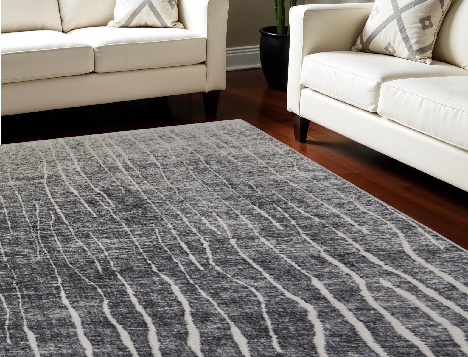 7' X 10' Ivory Gray and Black Abstract Power Loom Area Rug