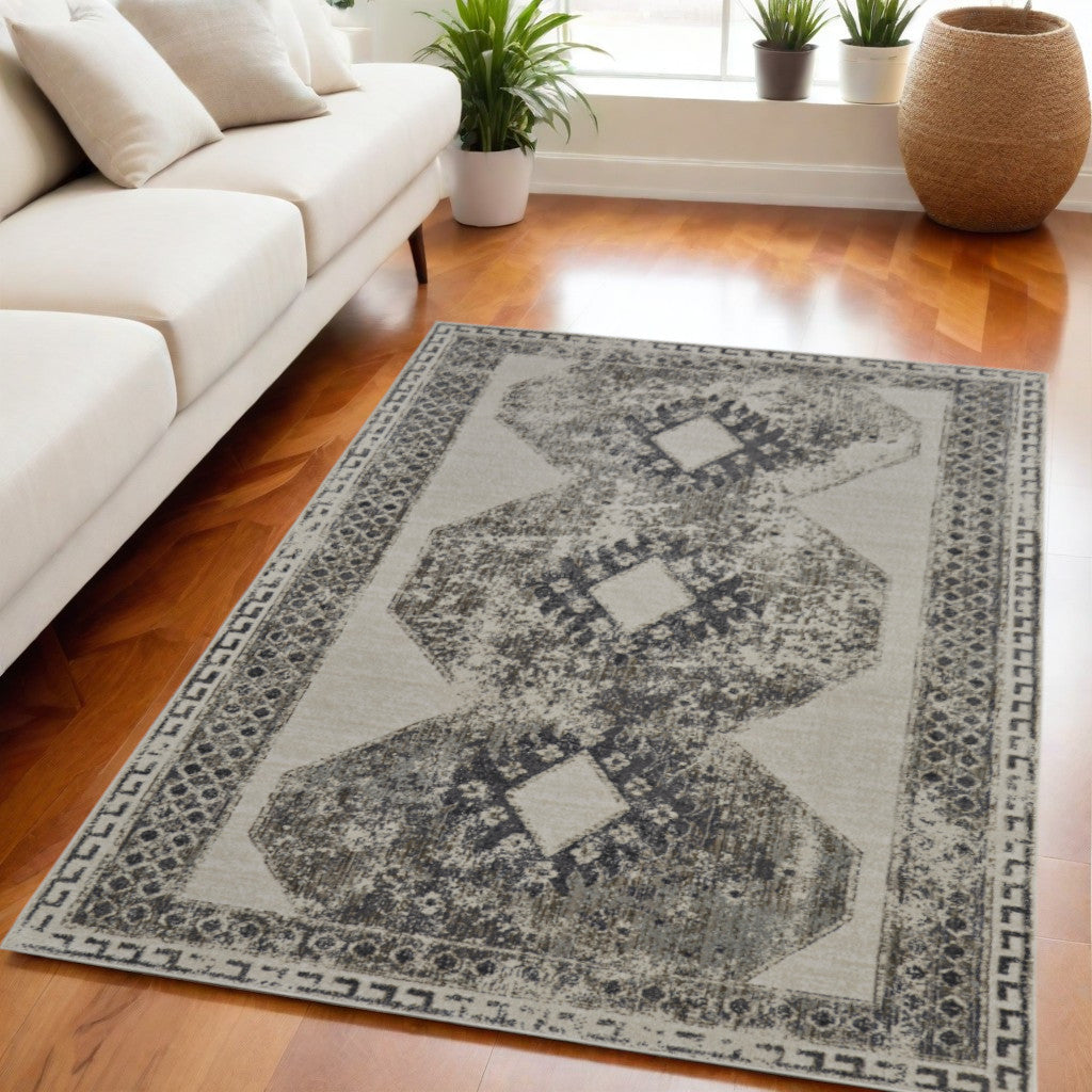 5' X 8' Gray and Ivory Abstract Power Loom Worn Faded Area Rug