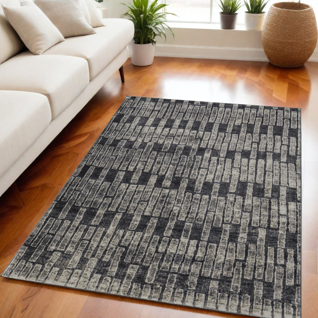 5' X 8' Gray and Black Geometric Power Loom Worn Faded Area Rug