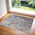2' X 3' Gray Ivory and Gold Abstract Power Loom Area Rug With Fringe