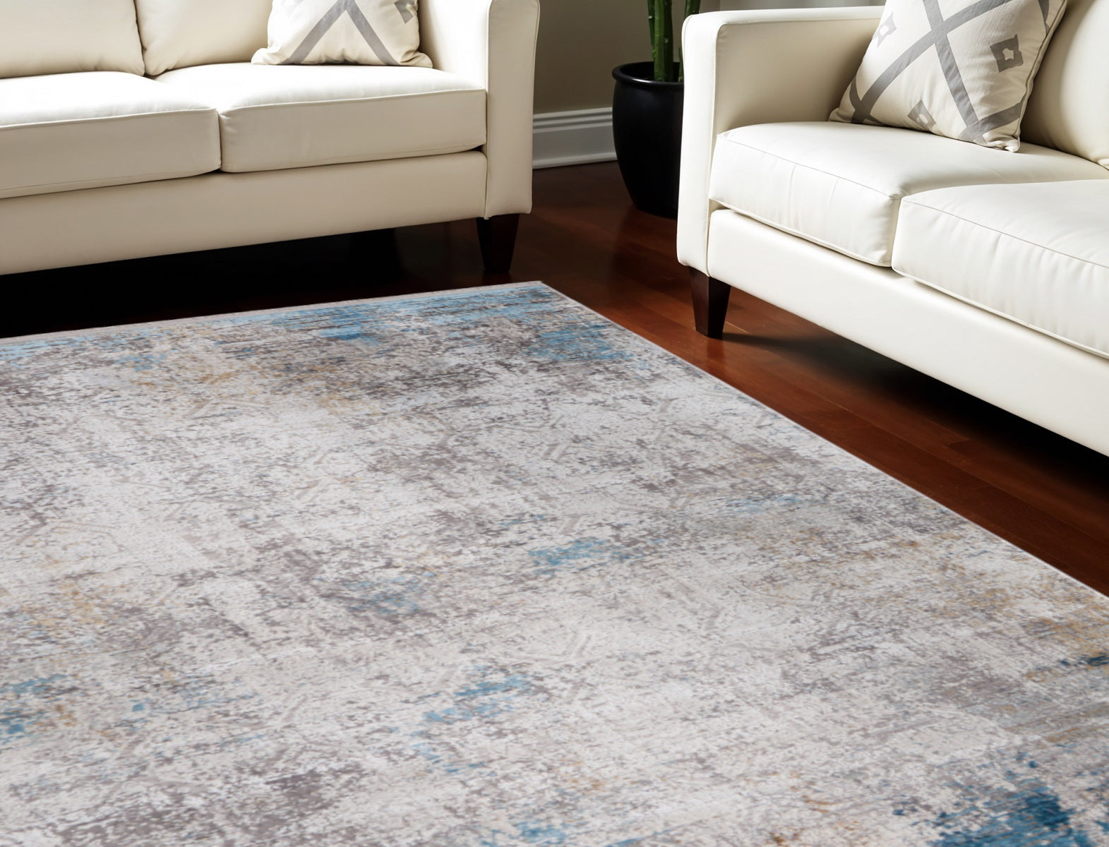 7' X 10' Ivory Gray and Blue Abstract Power Loom Area Rug With Fringe