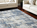 8' X 11' Ivory Tan and Blue Abstract Power Loom Area Rug With Fringe