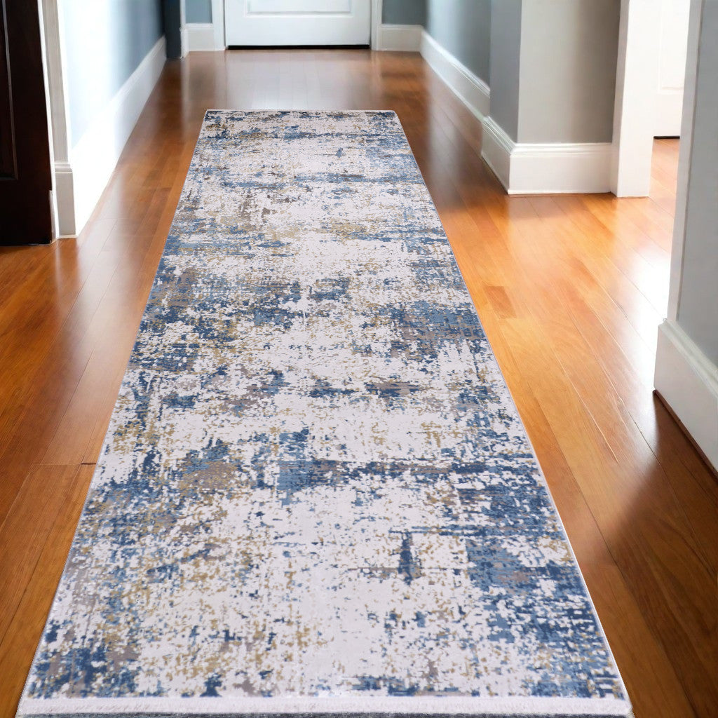 10' Ivory Tan and Blue Abstract Power Loom Runner Rug With Fringe