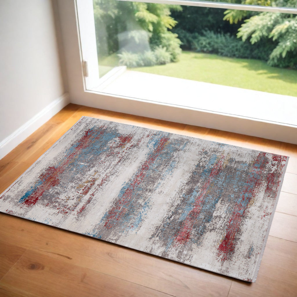 3' X 5' Gray Blue and Red Abstract Power Loom Area Rug With Fringe