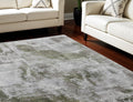 7' X 10' Gray Silver and Green Ikat Power Loom Area Rug With Fringe