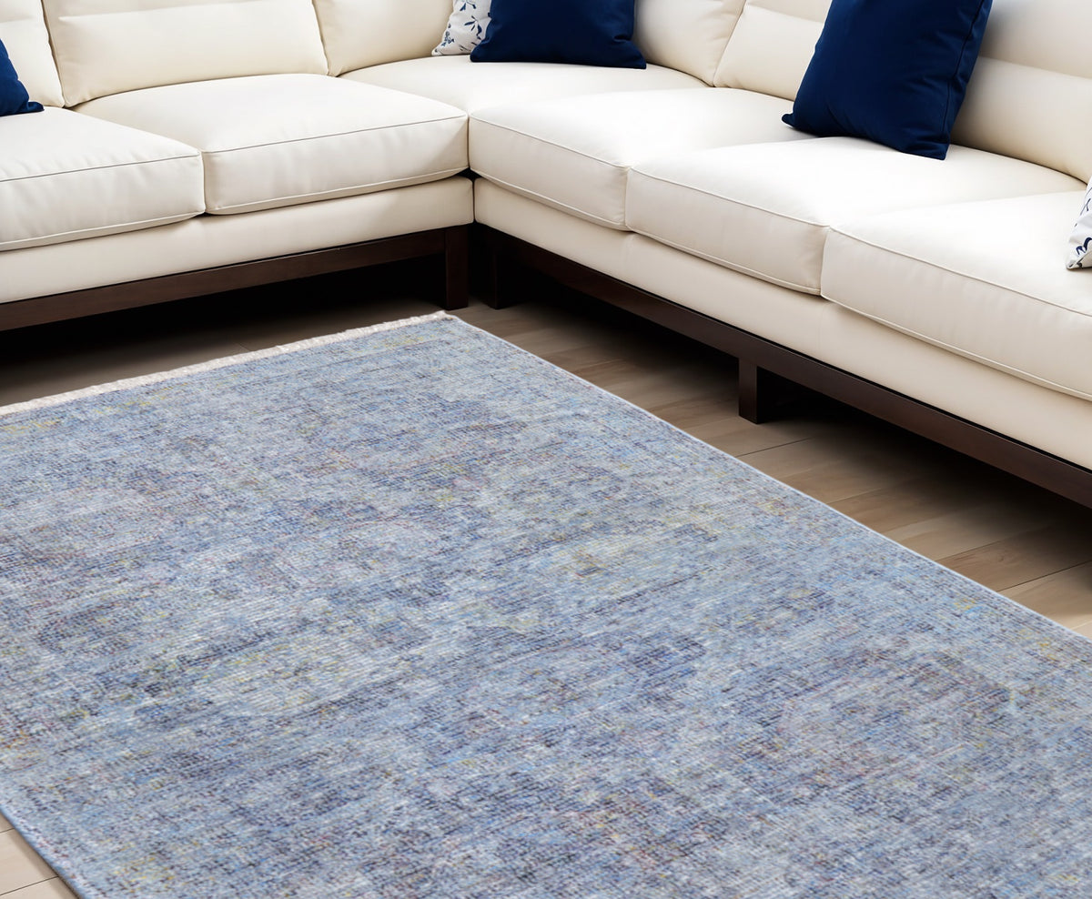 9' X 12' Blue and Ivory Abstract Hand Woven Distressed Area Rug With Fringe
